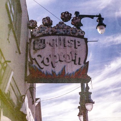 Old "Crisp Popcord" shop sign in Sugarhouse Utah