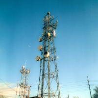 Utility Towers at dusk by thinbegin